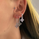 Cut out diamond earrings