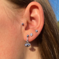 Silver eye earrings