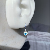 White evil eye earrings