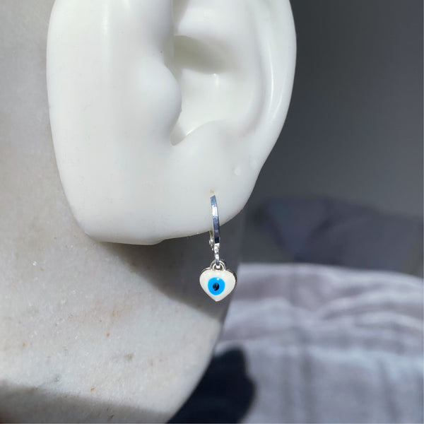 White evil eye earrings